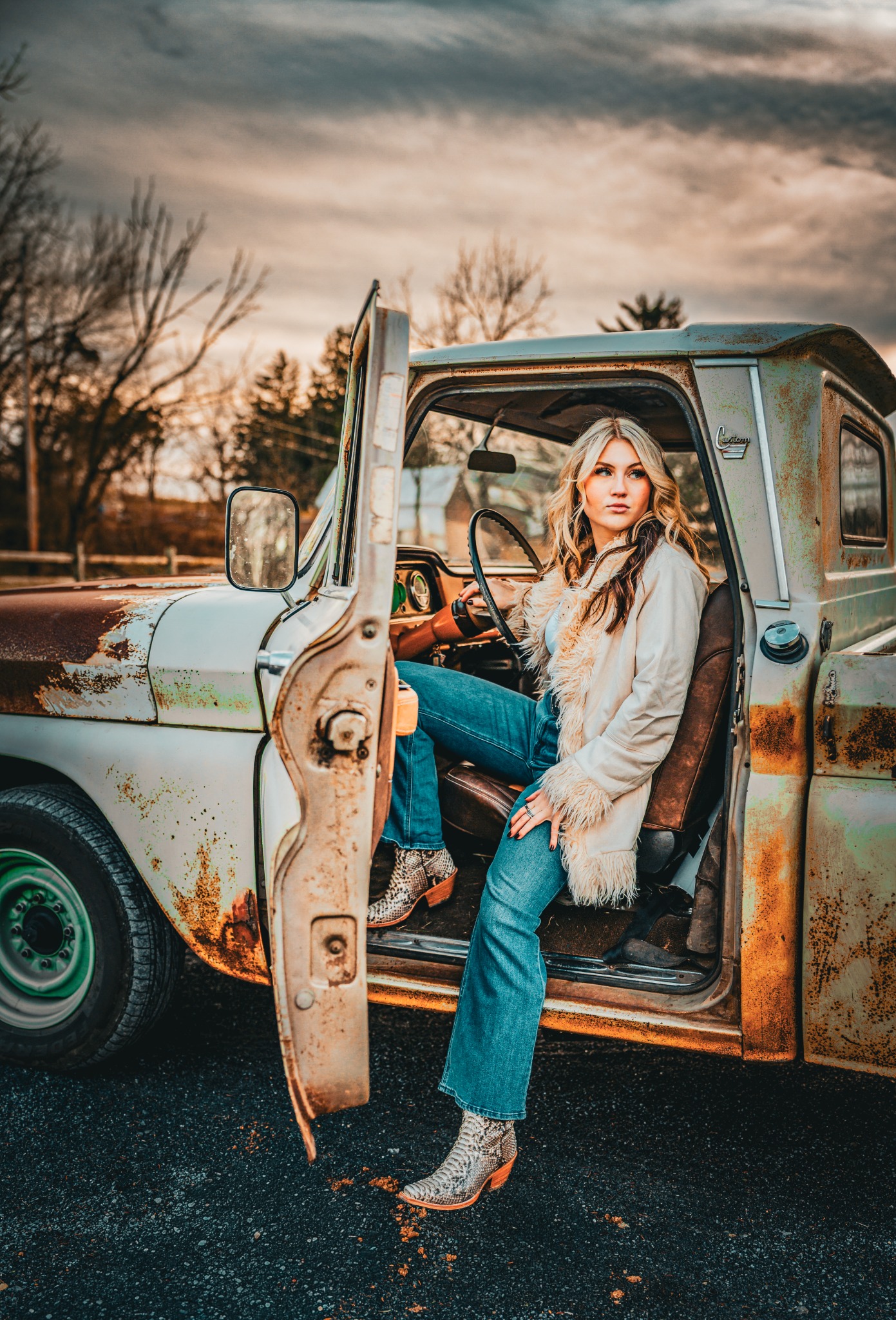 Lilly Moss wearing her signature cowboy hat in a country-inspired photoshoot
